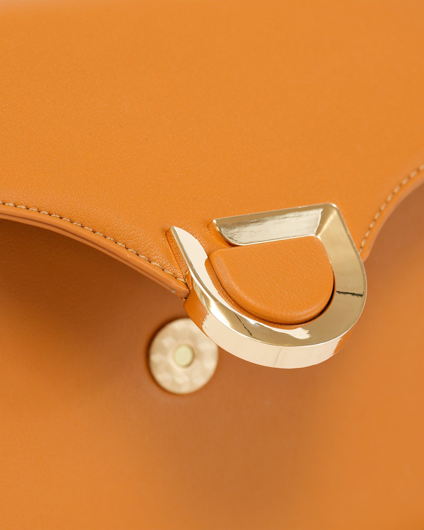 Elegant Crossbody Bag with Metal Closure and Adjustable Strap