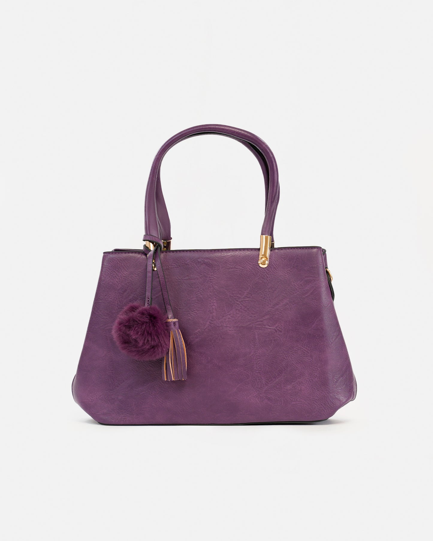 Handbag with pompom and metallic details
