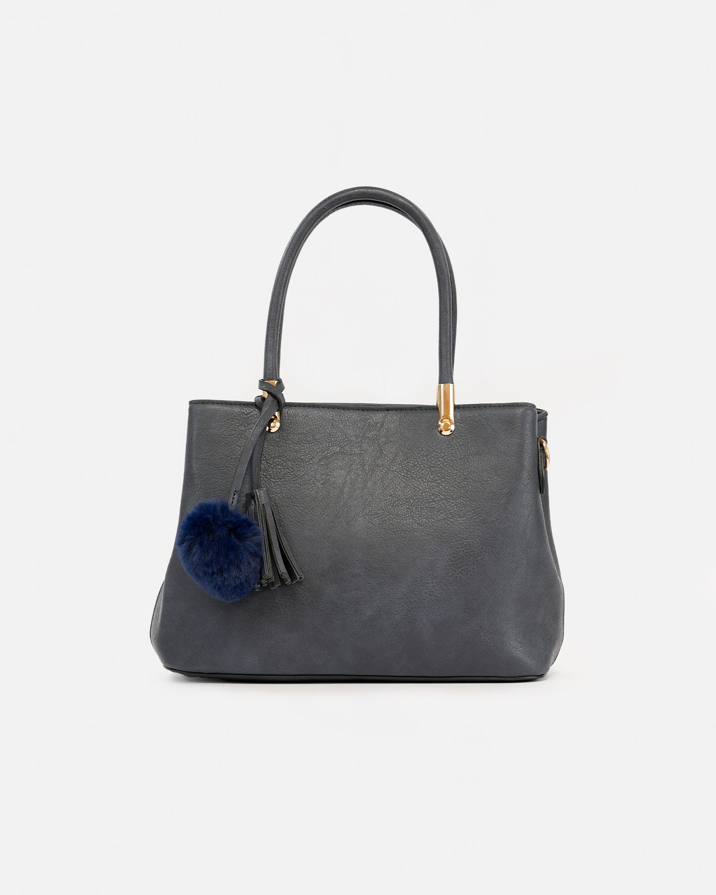 Handbag with pompom and metallic details