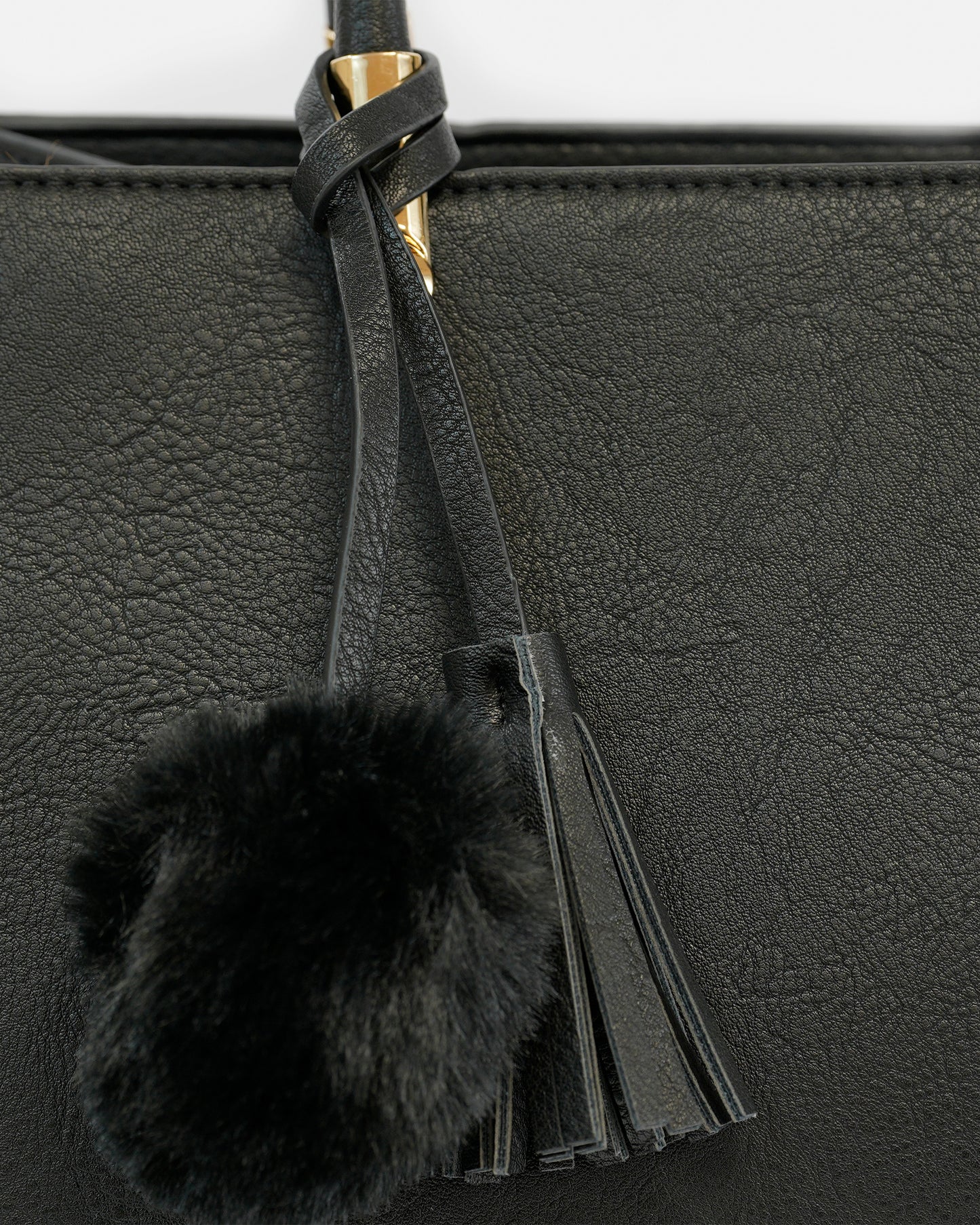 Bolso de Mano Elegante con Detalle de Borla y Pompon