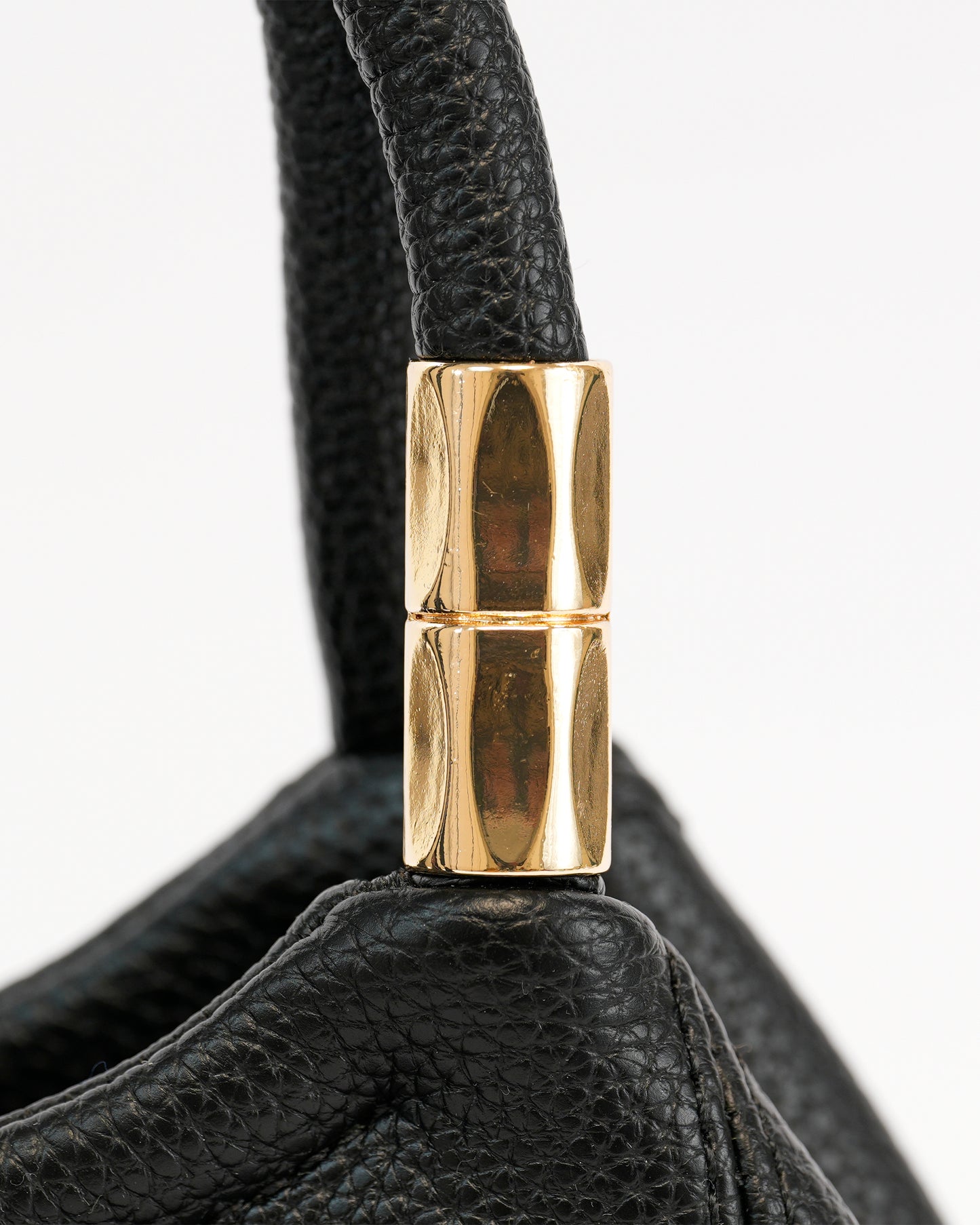 Elegant Handbag with Bow Detail and Adjustable Handle