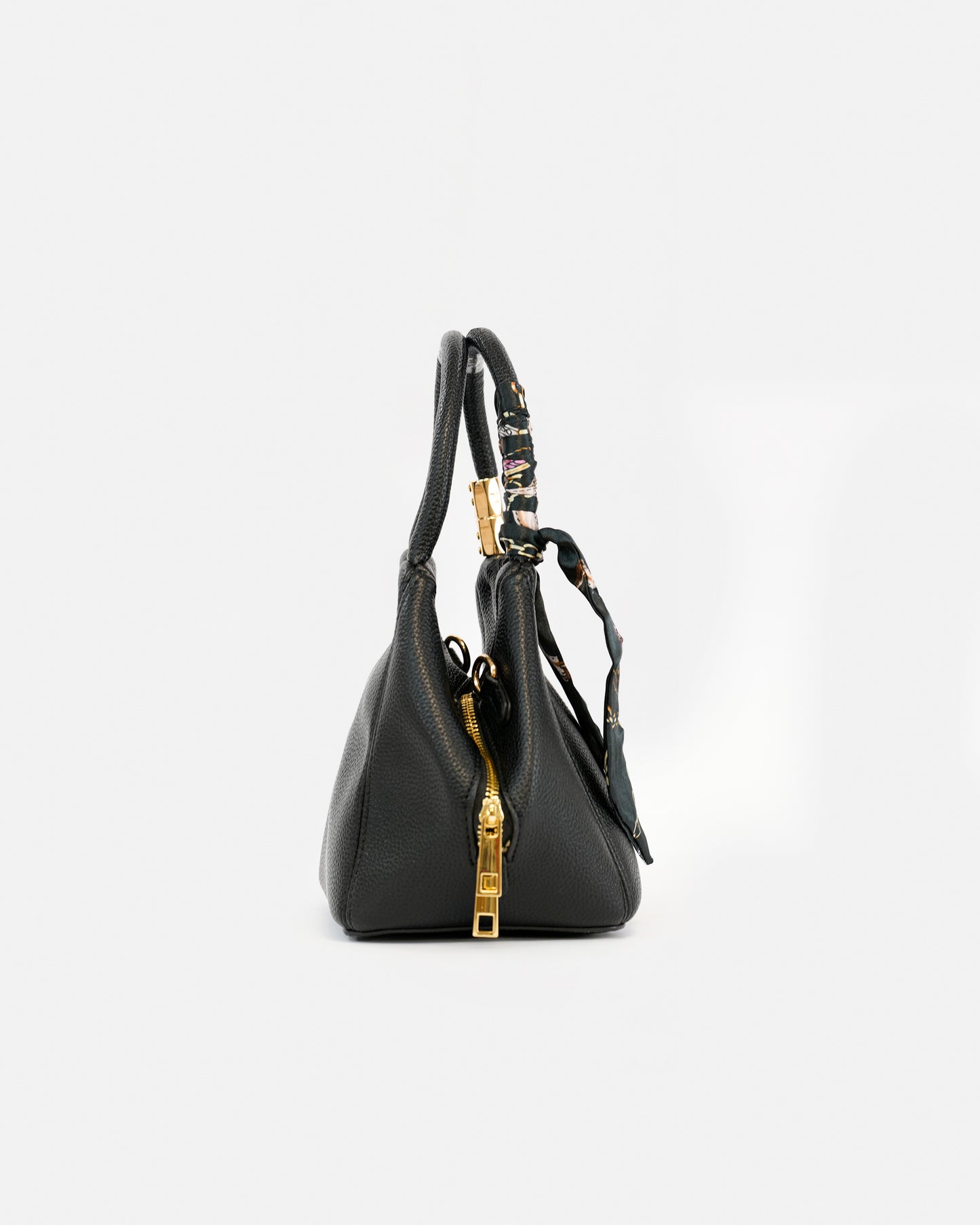Elegant Handbag with Bow Detail and Adjustable Handle