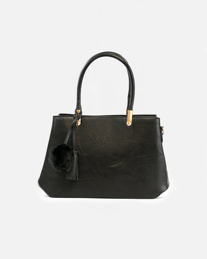 Handbag with pompom and metallic details