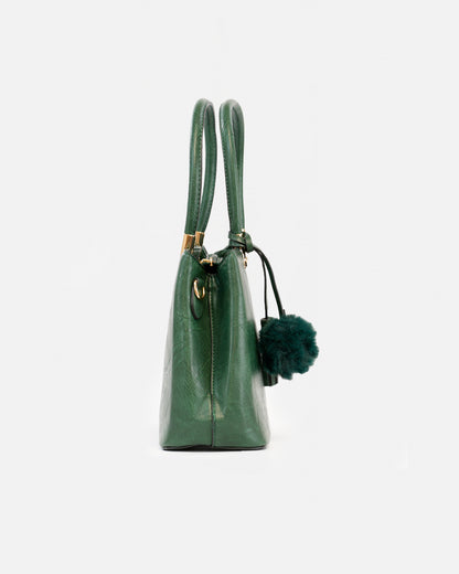 Handbag with pompom and metallic details
