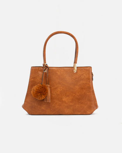 Handbag with pompom and metallic details