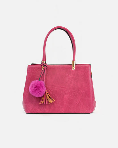 Handbag with pompom and metallic details